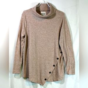 Cream asymmetrical button hem top